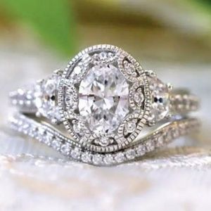 Silver Three Stone Oval Cut Fancy Halo Diamond Ring